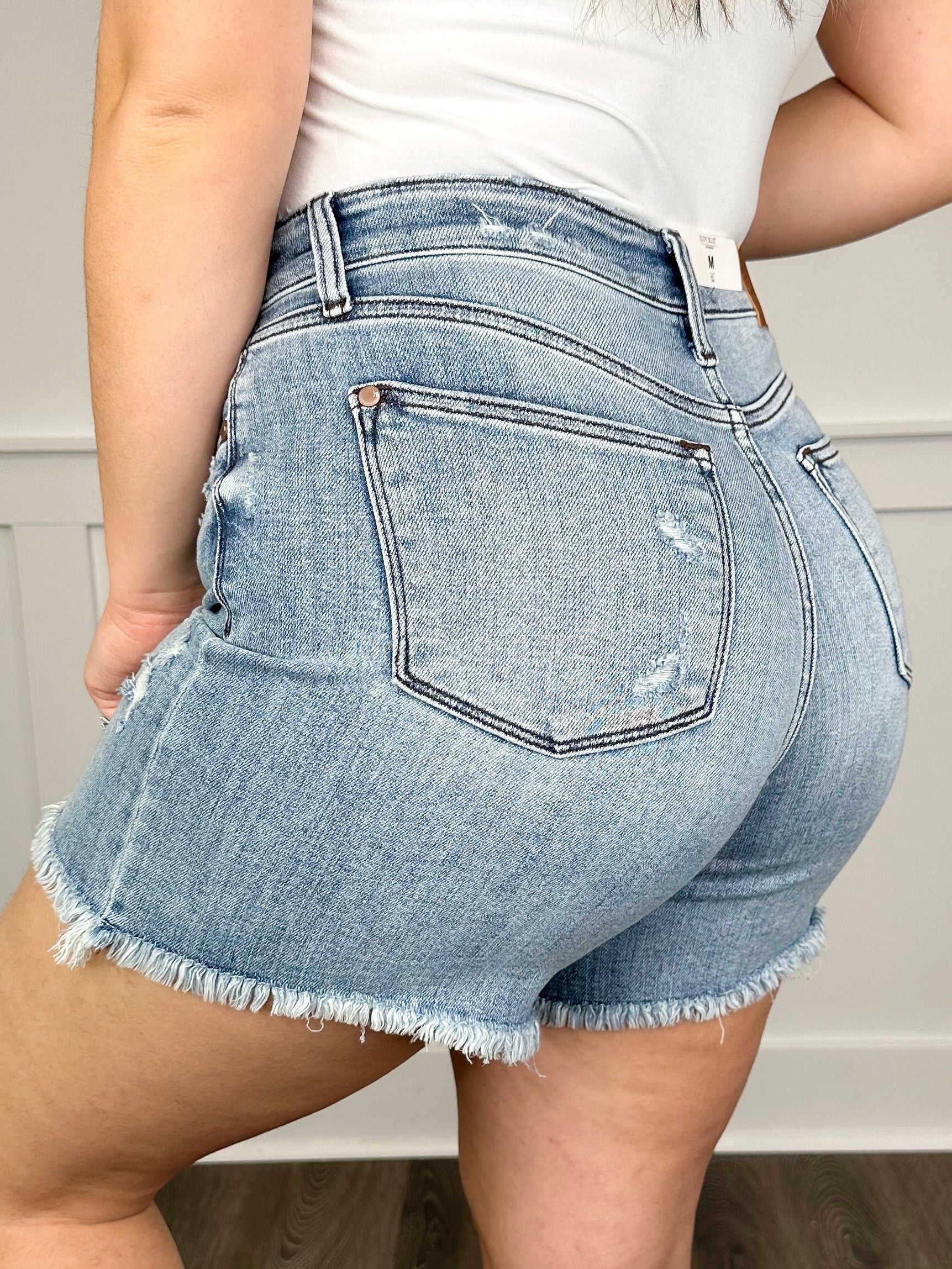 Judy Blue Karsyn Distressed High-Rise Fray Hem Medium Wash Shorts - Image 4