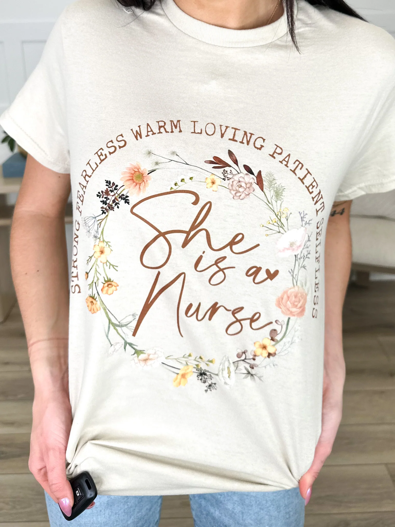 She is a Nurse Cotton Short Sleeve Sand Avery Mae Graphic Tee Shirt (Gildan)
